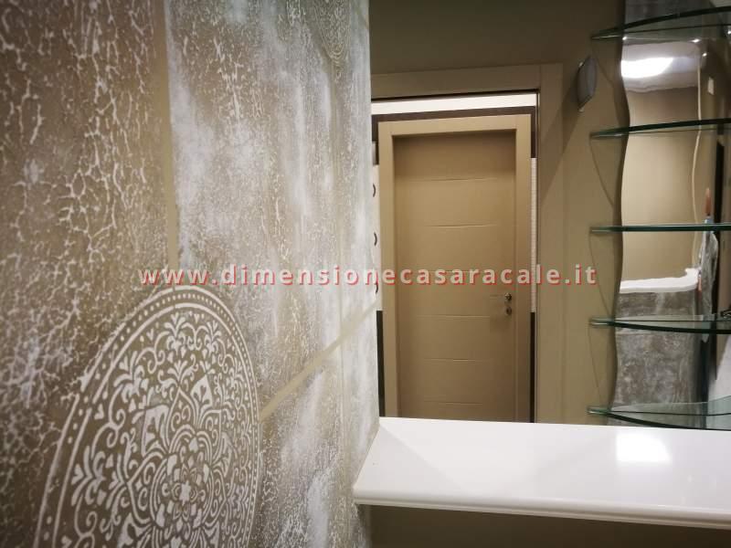 installazione in Lecce e provincia porte interne tamburate marchio Flessya linea Nidio 13