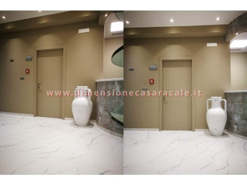 installazione in Lecce e provincia porte interne tamburate marchio Flessya linea Nidio 2 laccato Extra Grigio Becker 4477 2