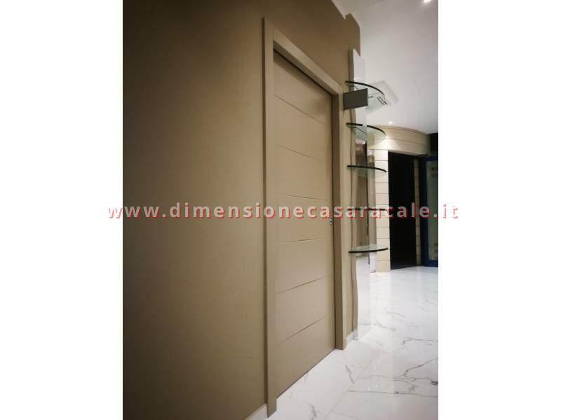 installazione in Lecce e provincia porte interne tamburate marchio Flessya linea Nidio 7 7