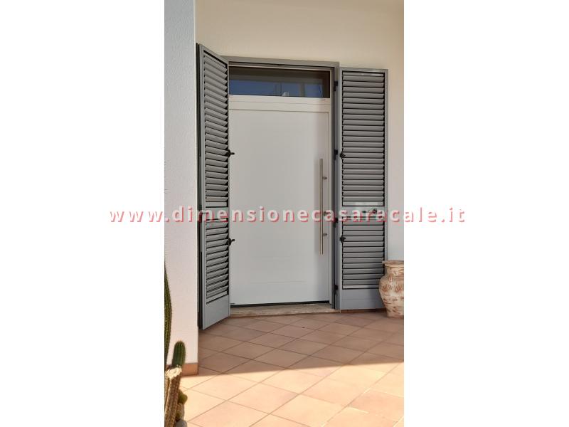 Portoni in alluminio a marchio TEHNI 8