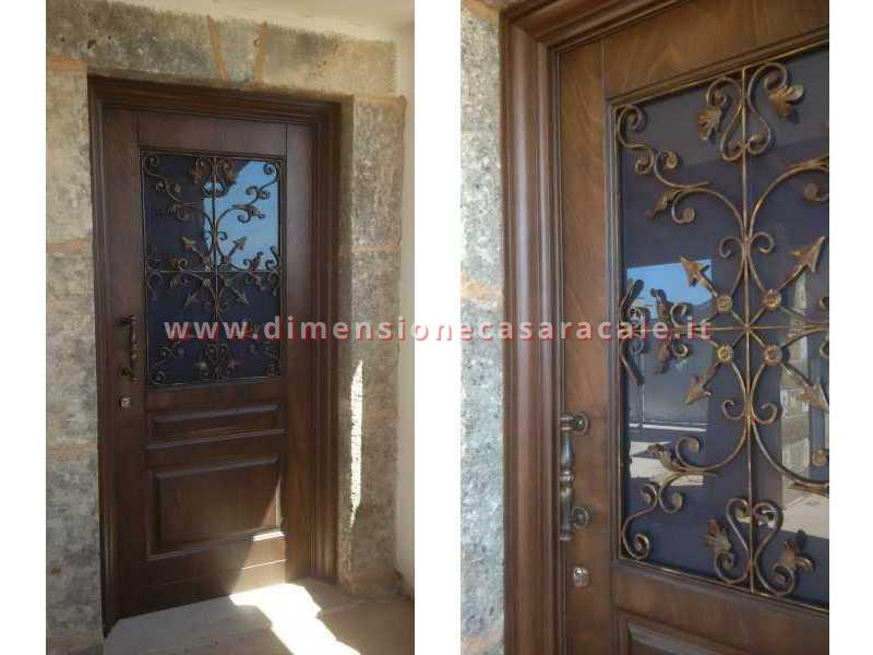 portoni in legno da ingresso Fiore Ebanisteria 8