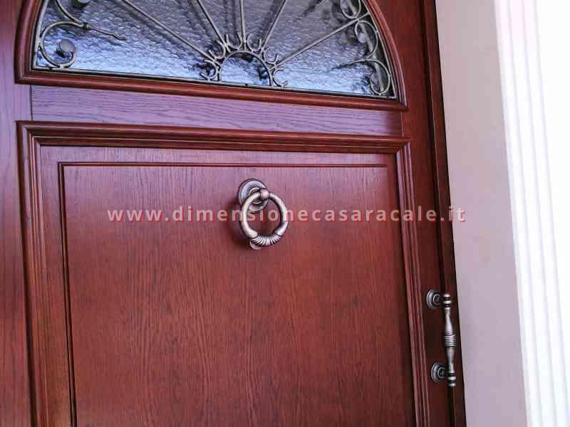 Portone d'ingresso in legno massello di Rovere tinto noce 2