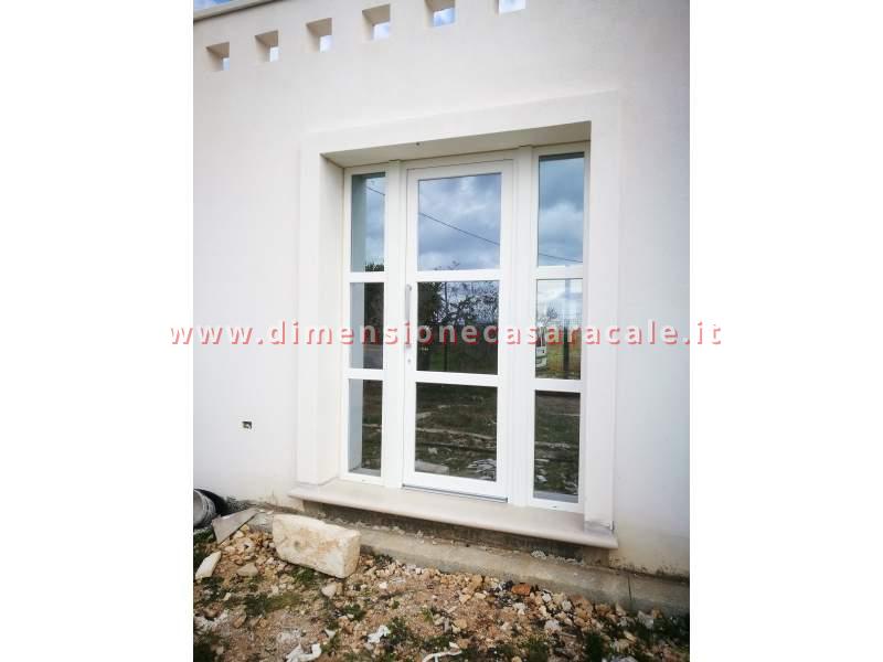 Portoni in PVC con profilo Rehau  1
