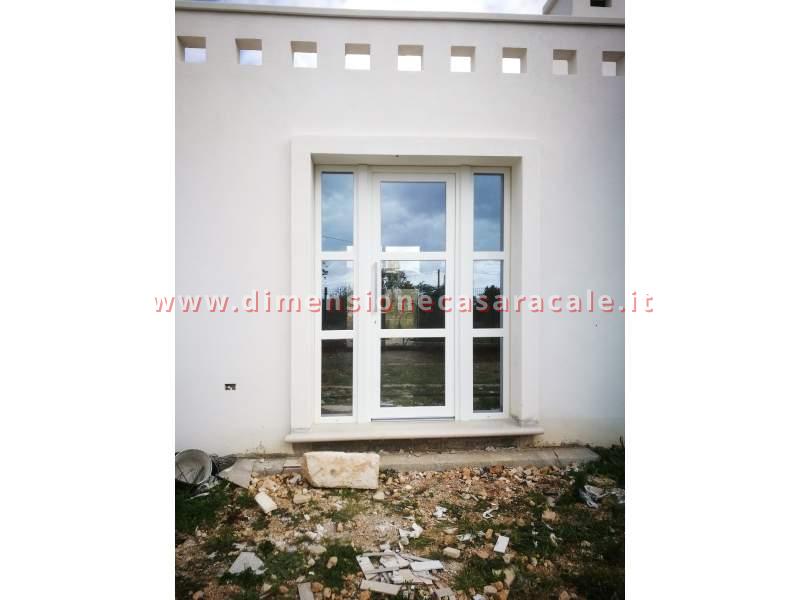 Portoni in PVC con profilo Rehau  2