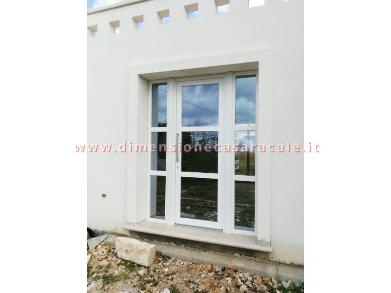 Portoni in PVC con profilo Rehau  4
