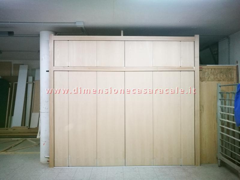 Realizzazione e installazione di cabina armadio in legno su misura con laccatura bianca 6 6